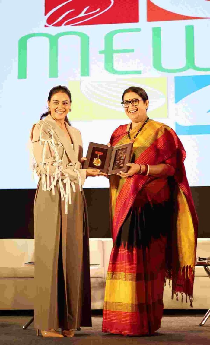 Genelia Deshmukh gets felicitated by Smiriti Irani at MEWA India 2025 for Imagine Foods